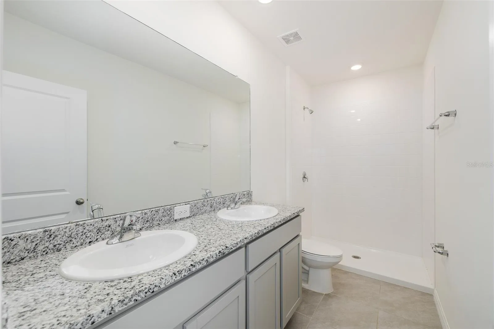 Primary Bath with Double Sink &amp; Granite Countertop