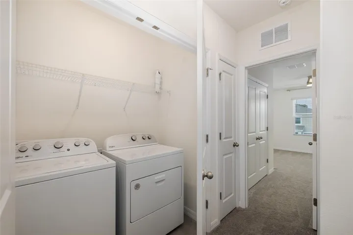 Laundry area upstairs with quick access to bedrooms