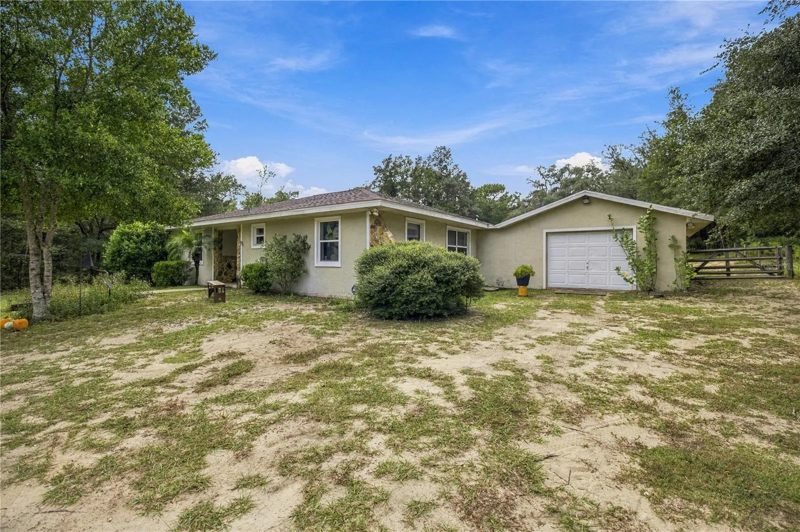FROM DRIVEWAY TO GARAGE AND NE CORNER OF HOME