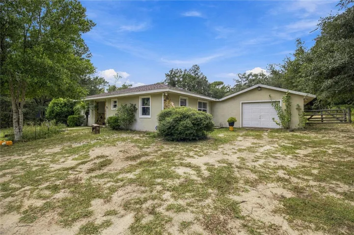 FROM DRIVEWAY TO GARAGE AND NE CORNER OF HOME