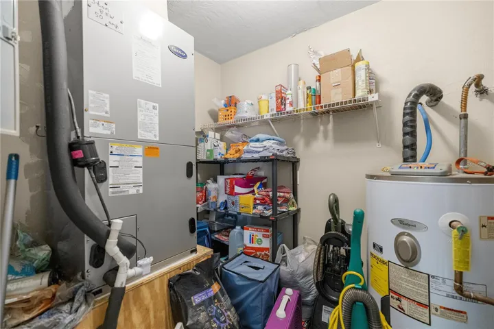 LIVING AREA STORAGE WATER HTR &amp; AC CLOSET