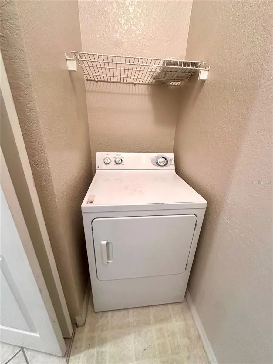 Dryer off Kitchen in Laundry Closet