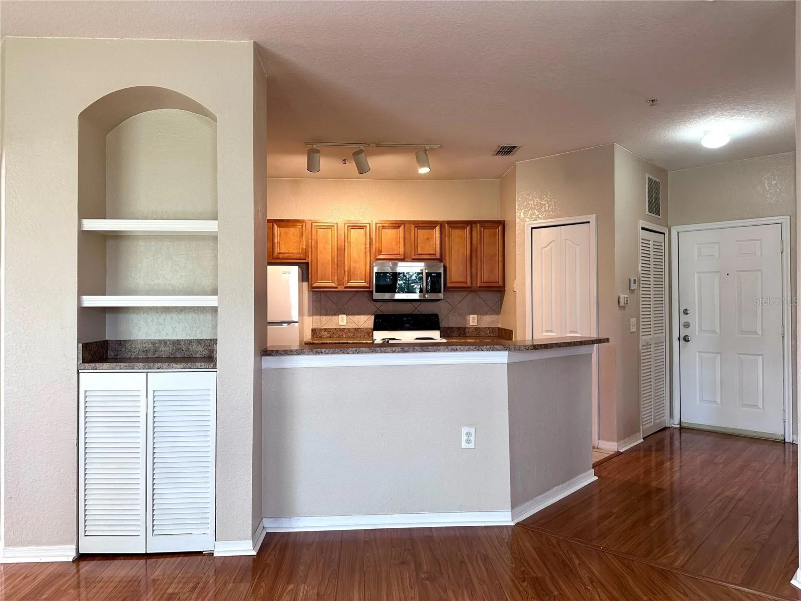 Front Entry and Kitchen Barstool View