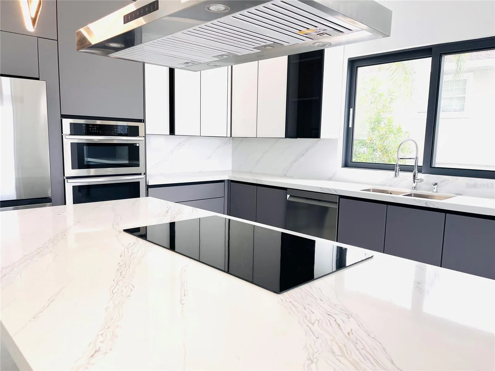 KITCHEN ISLAND WITH UPDRAFT EXHAUST