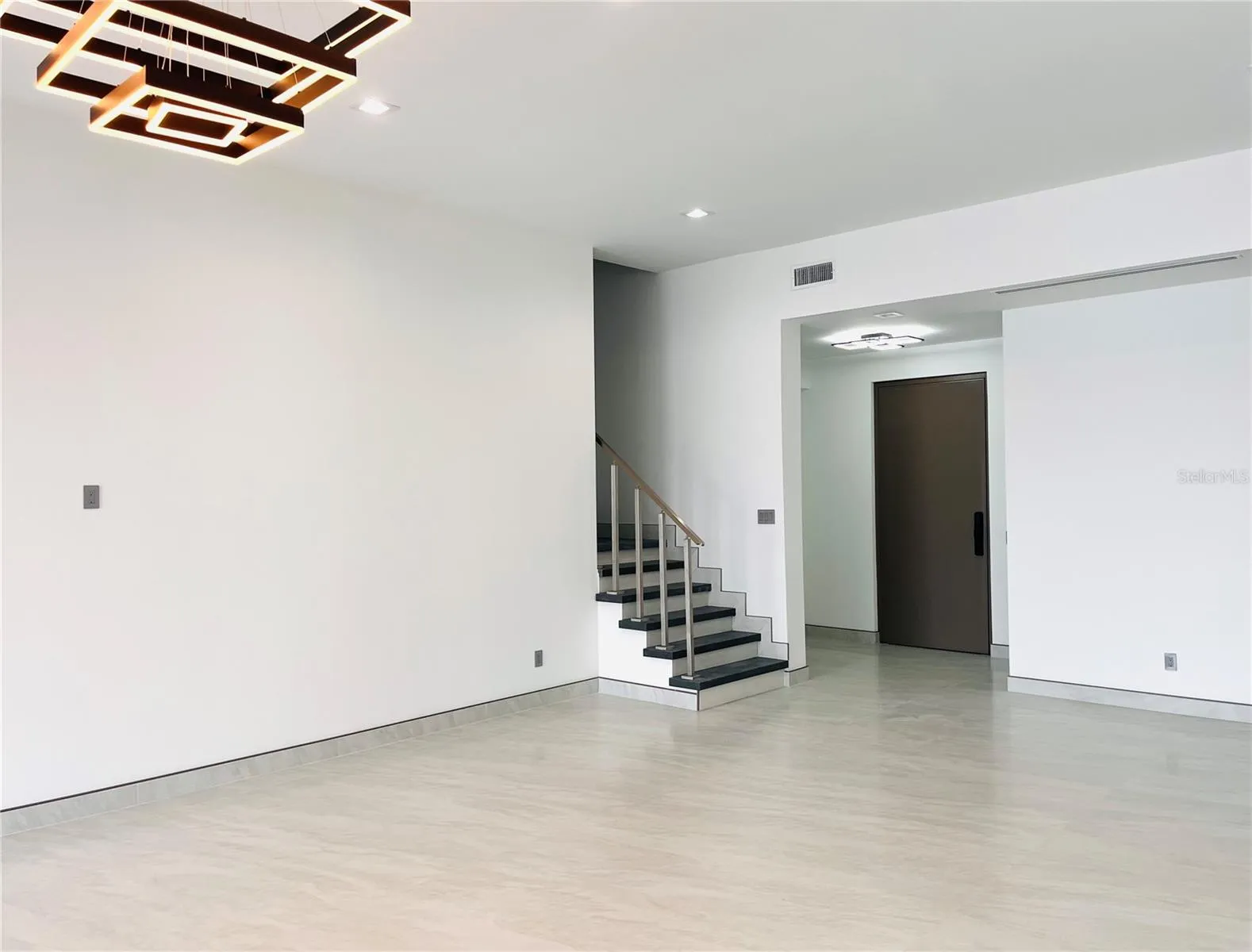 FOYER ENTRY AND GREAT ROOM