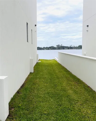 NORTH SIDE WITH SURROUNDING WALL