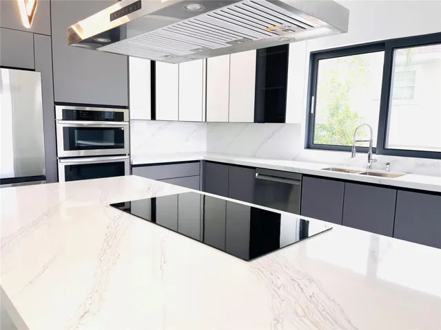 KITCHEN ISLAND WITH UPDRAFT EXHAUST