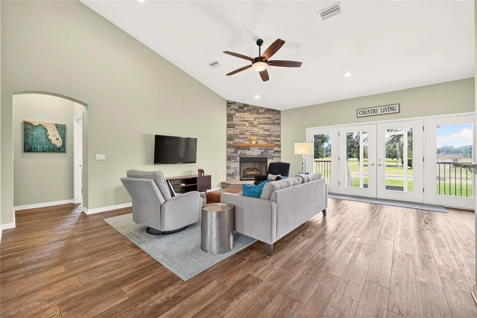 Open concept living area enjoys natural light and beautiful views of the east pastures.