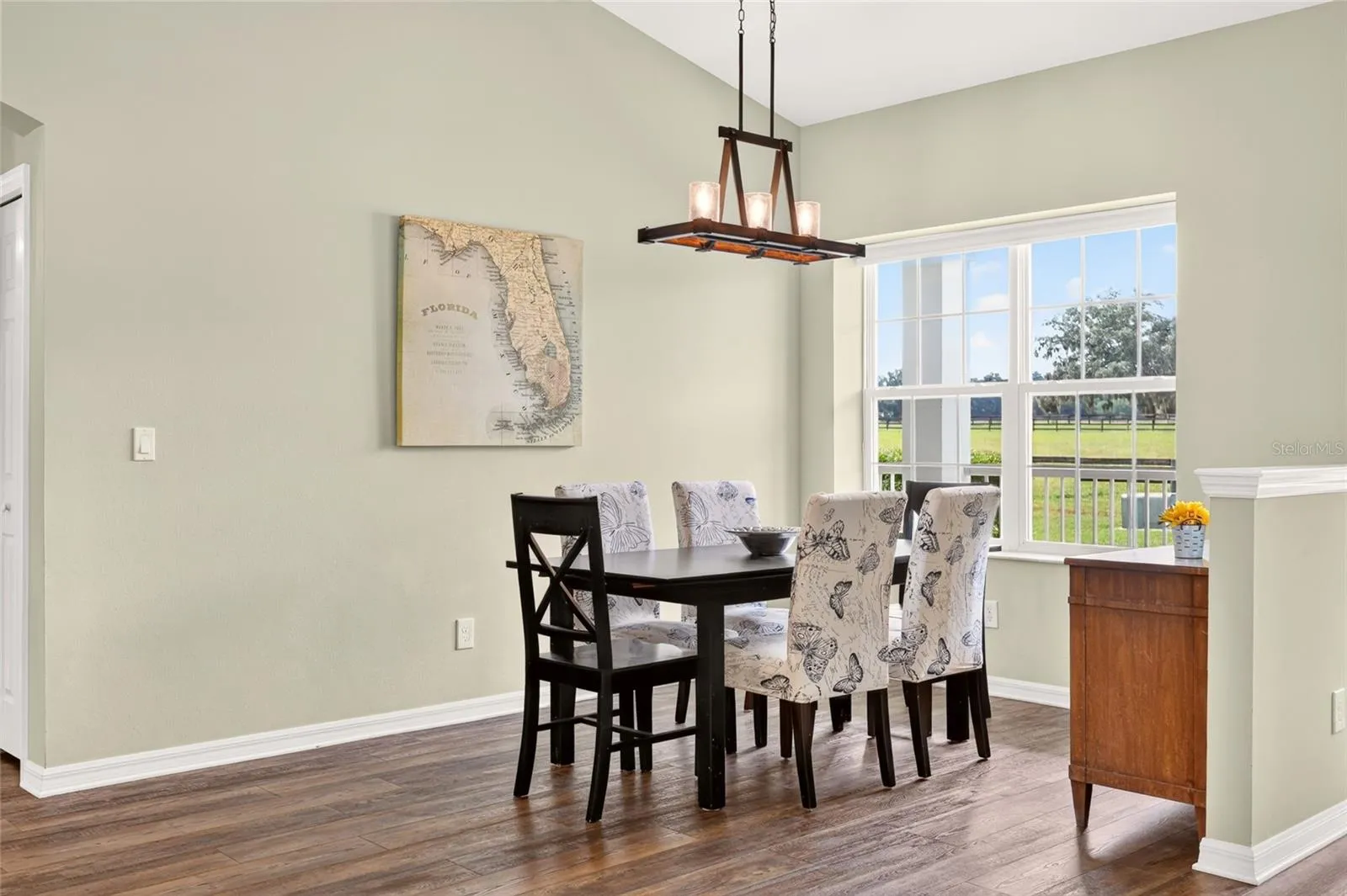 Dining area can easily accommodate a larger table with more seating.
