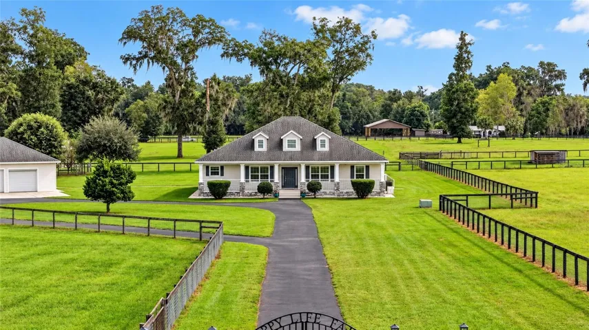 Custom-Built Farmhouse on 13.58 acres.