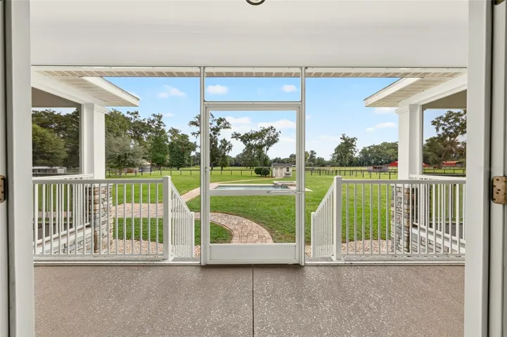 Expansive rear screened porch.