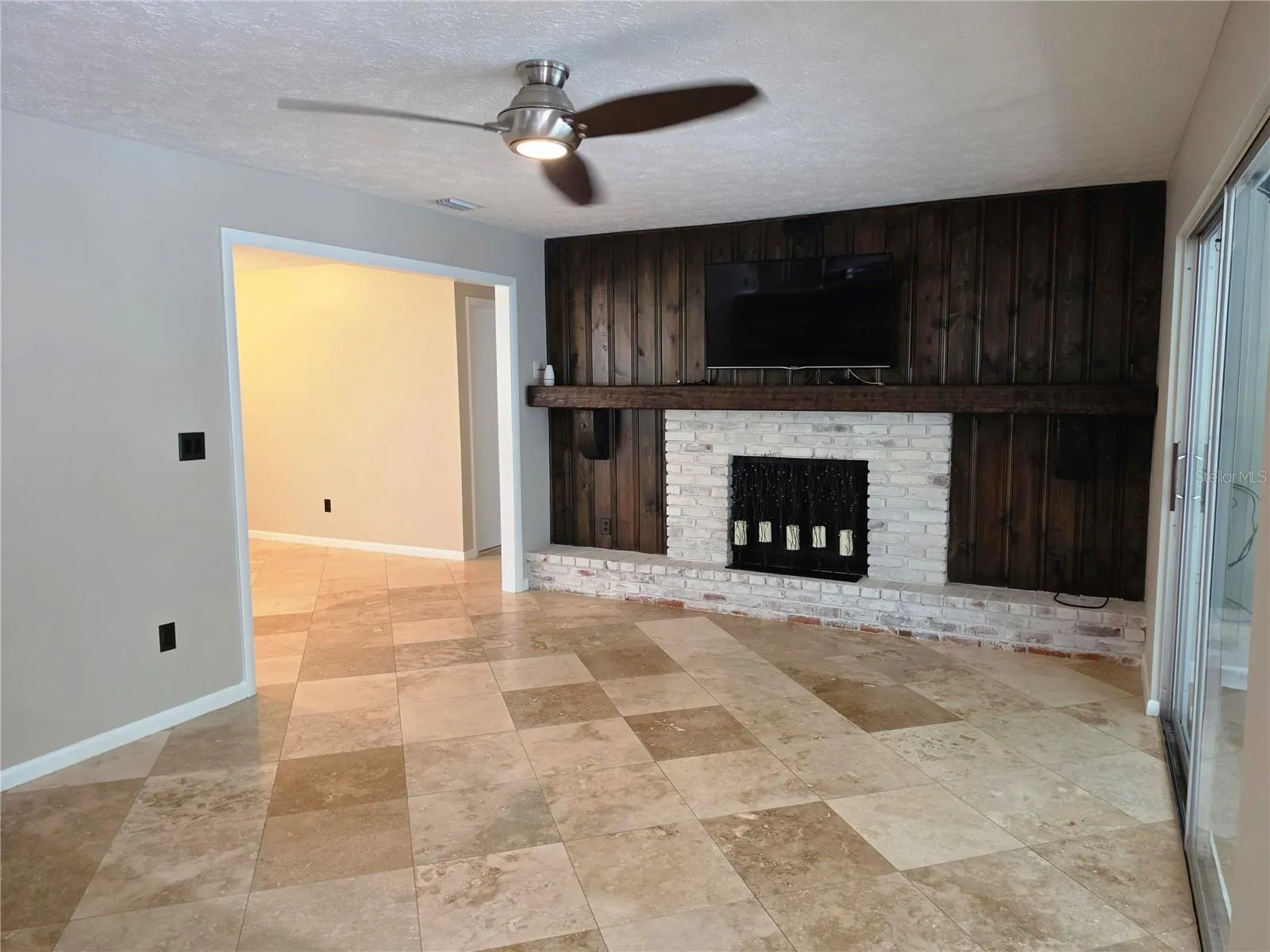 Family room with fireplace (woodburning but capped and not in use)