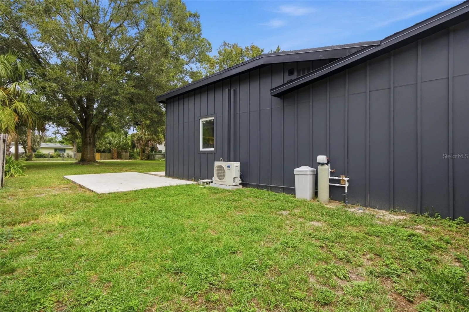 Generous side yard-additional outdoor space-features water softener