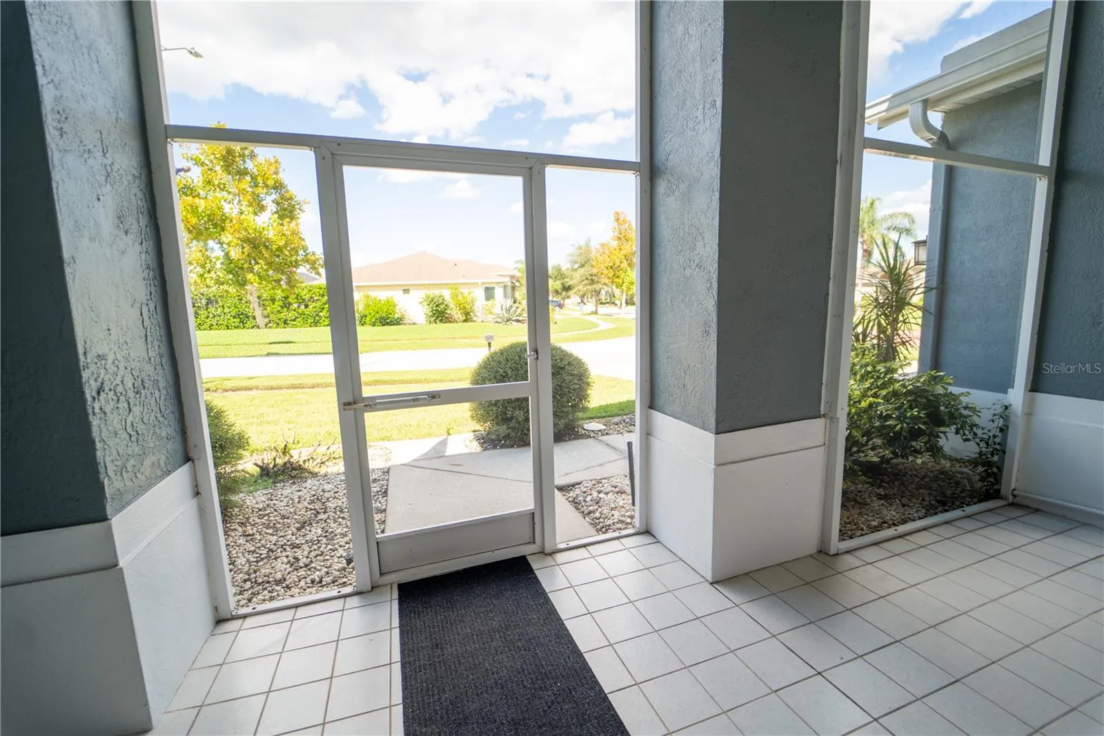 SCREENED IN FRONT PATIO