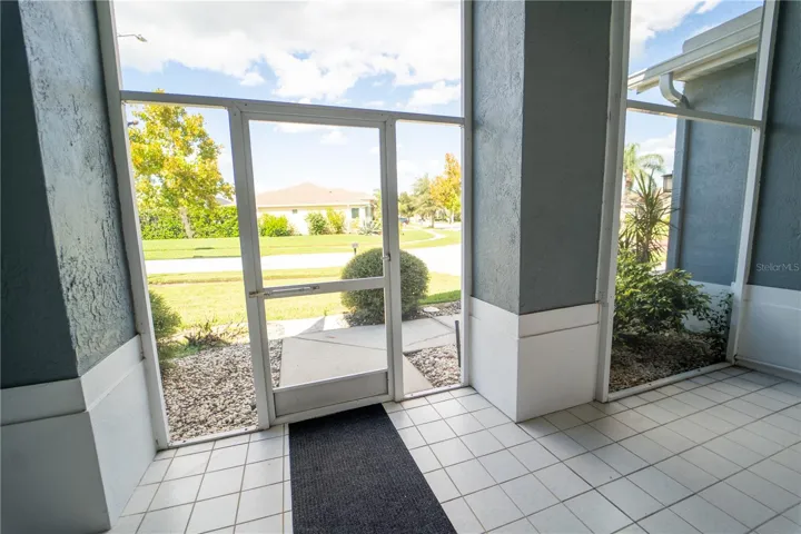 SCREENED IN FRONT PATIO