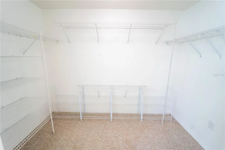 1 of 2 WALK IN CLOSETS IN PRIMARY