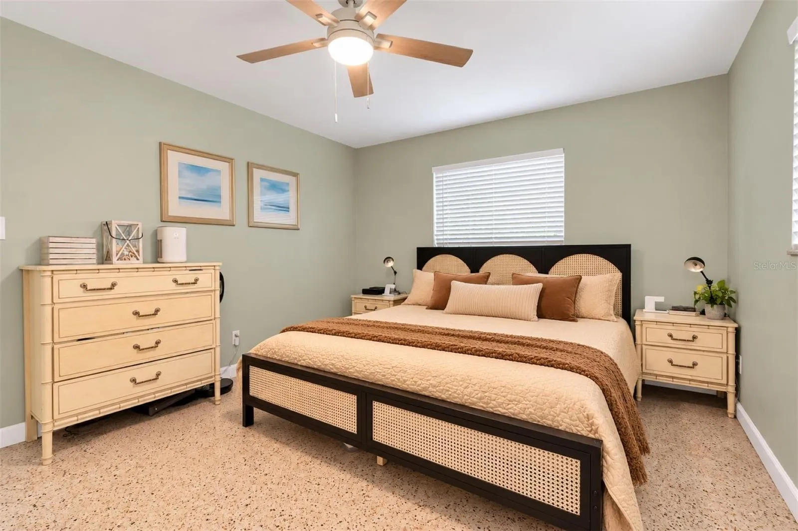 Primary bedroom with a private ensuite bath