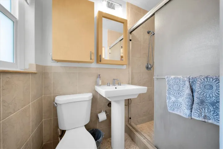 Ensuite bath with updated finishes and walk-in shower