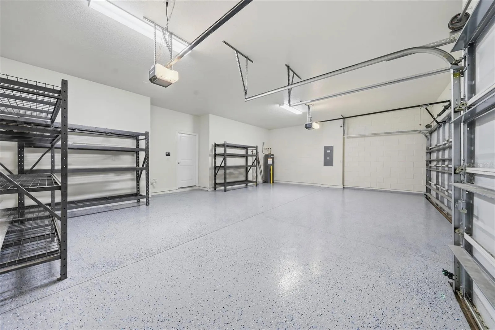 Three-car garage, freshly painted garage floor coating
