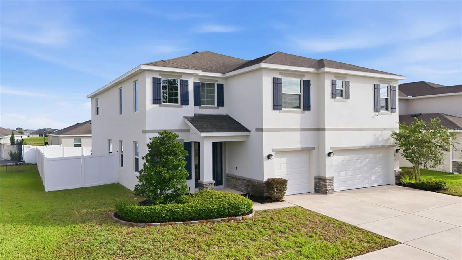 Two-story home with a 3-car garage in Brookhaven