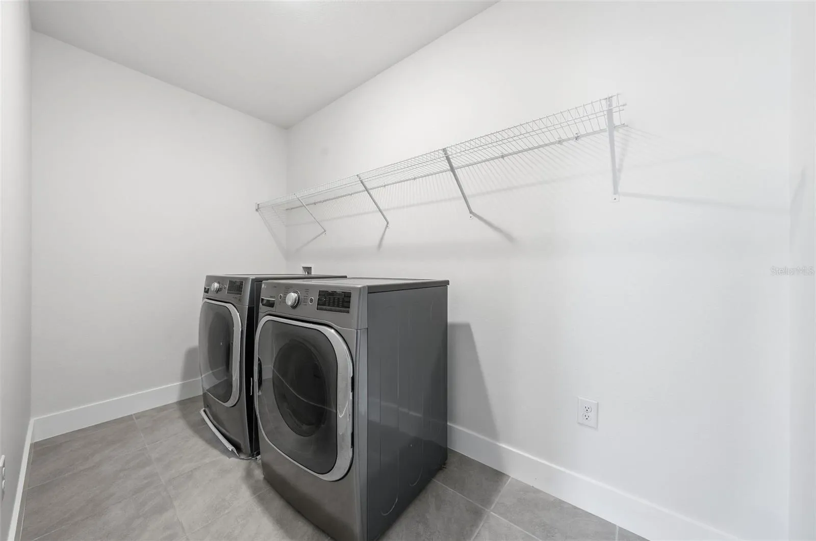 Laundry room. LG washer and dryer convey