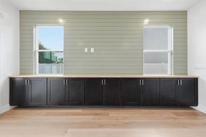 Custom built-ins and shiplap accent wall in the living room