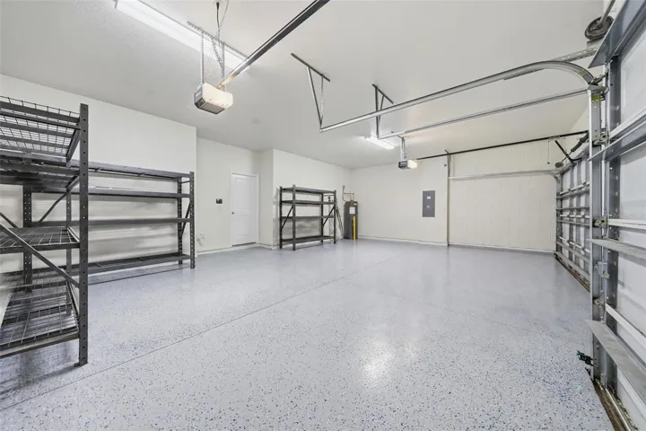 Three-car garage, freshly painted garage floor coating