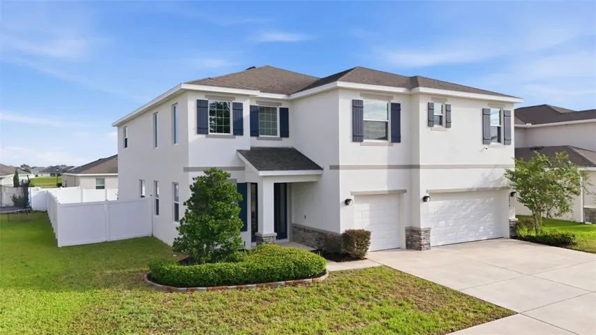 Two-story home with a 3-car garage in Brookhaven