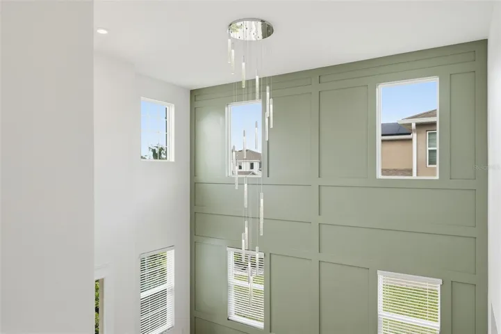 New chandelier anchors the two-story entry