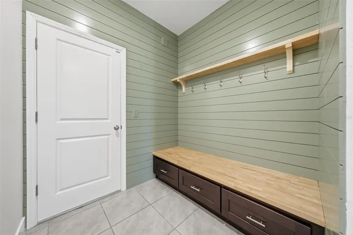 Custom mudroom drop zone off the garage