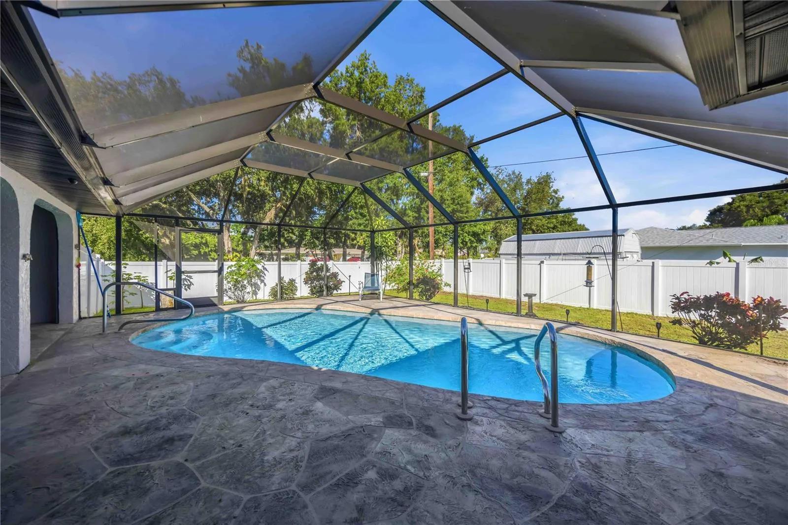 Pool and lanai under screened enclosure