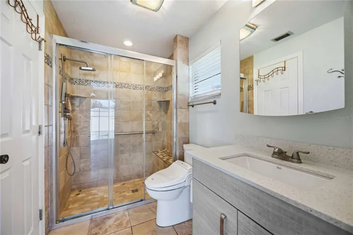 Bathroom with glass walk-in shower