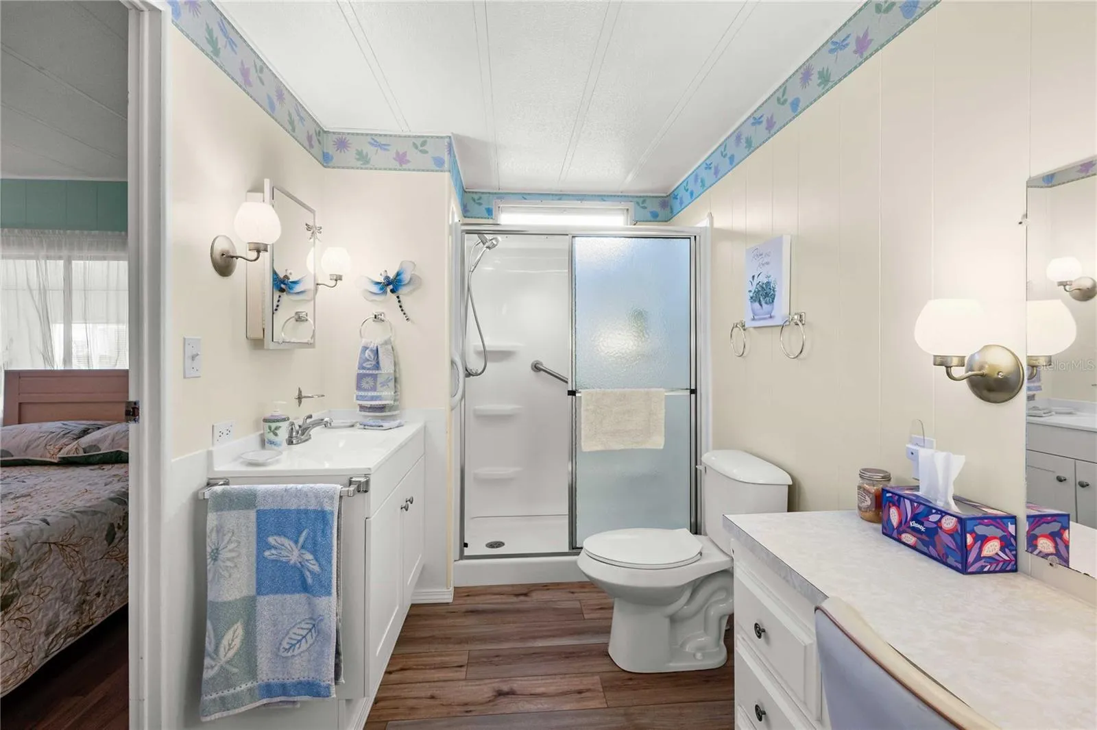 Guest bath has step-in shower.