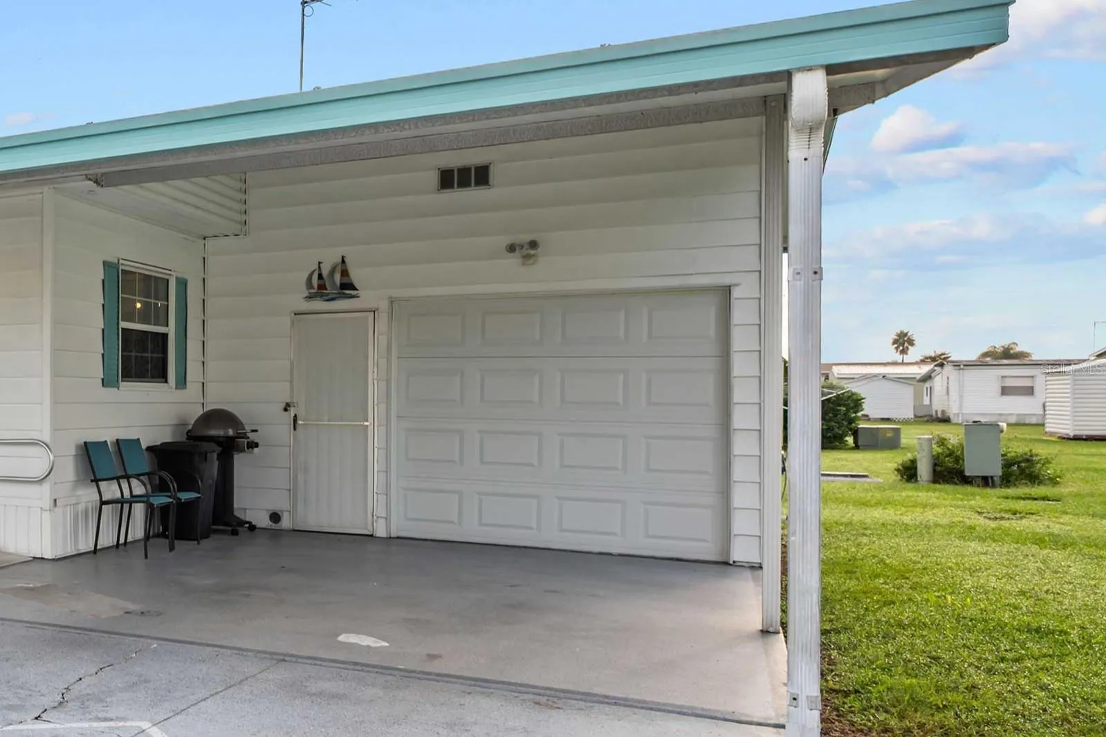 Golf cart garage and additional storage.