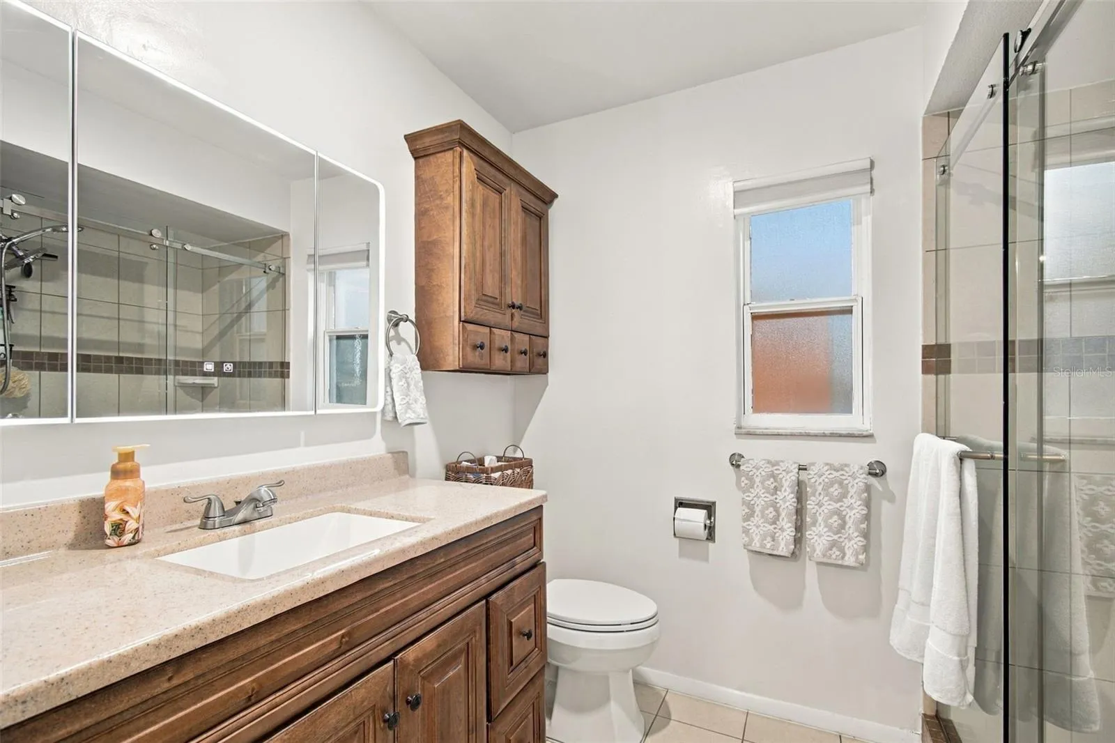 CUSTOM CABINETRY IN ENSUITE BATHROOM