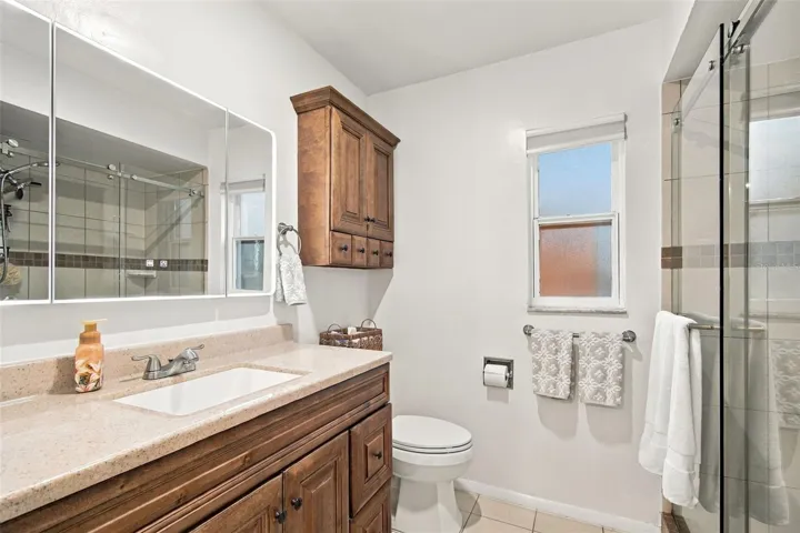 CUSTOM CABINETRY IN ENSUITE BATHROOM