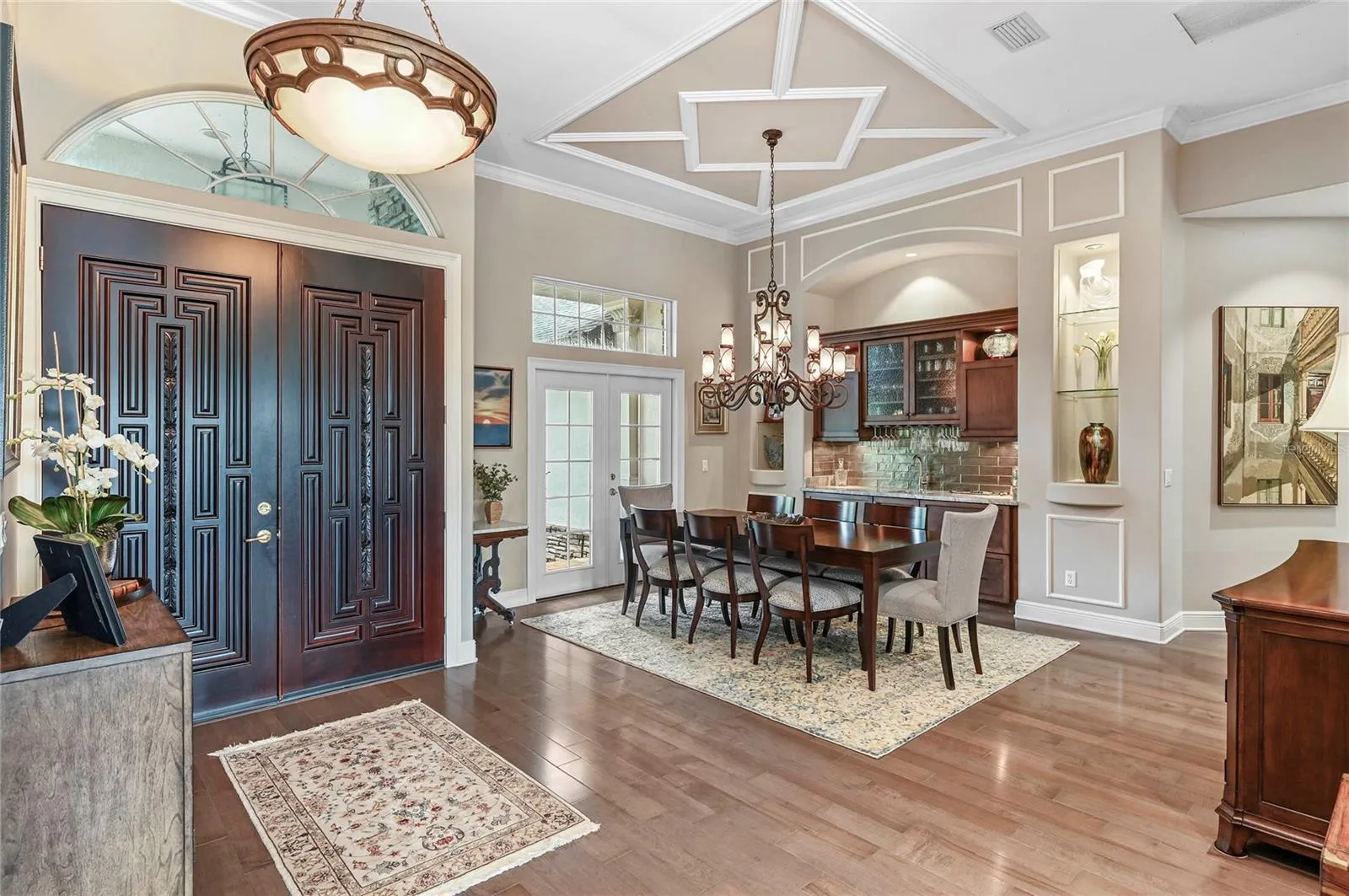 Nice open foyer that  opens to living and dining rooms