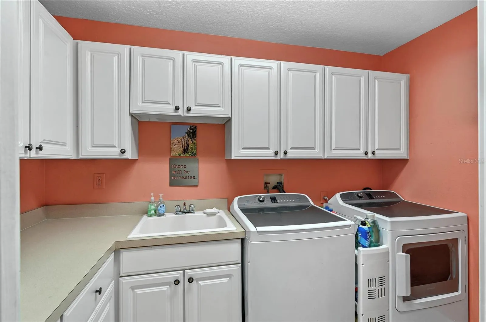 Downstairs Laundry Room with Tons of Storage
