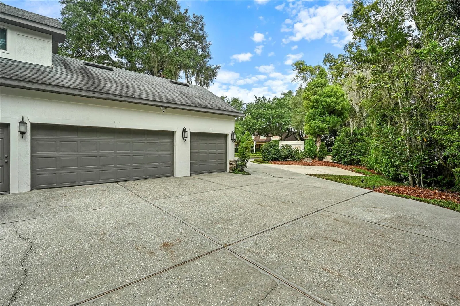 Spacious Driveway Area with 3 Car Garage