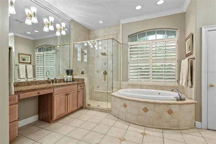 Primary Bathroom with Separate Shower and Jetted Spa Tub