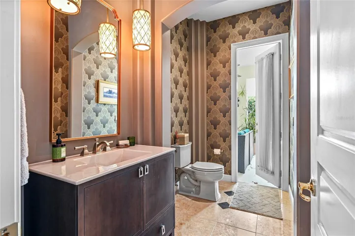 Half Bath with direct access to covered patio area