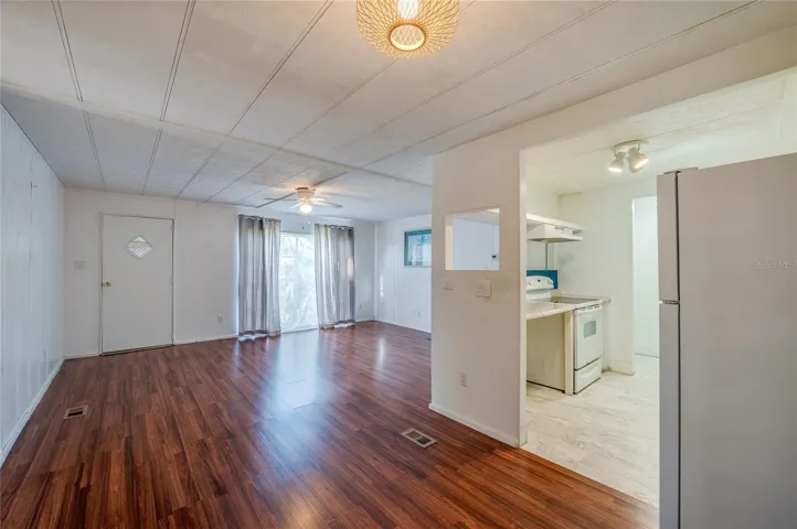 Spacious main living area offers an open layout with abundant natural light and direct connection to the kitchen, creating flexible options for everyday living and dining.