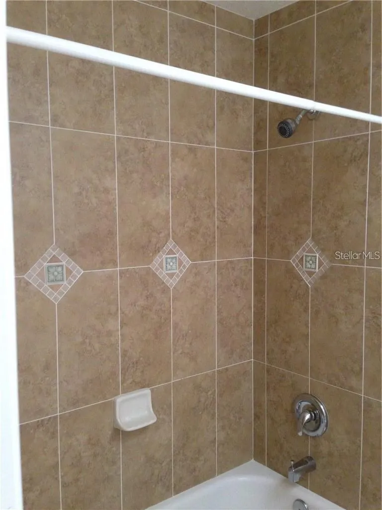 TILE WALLS IN GUEST BATH 2