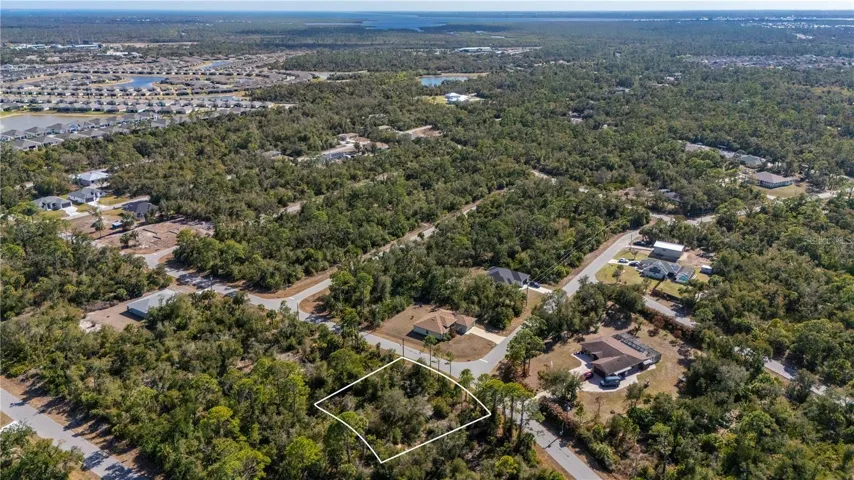 View of the oversized lot and to the Southeast is the new communities of West Port.