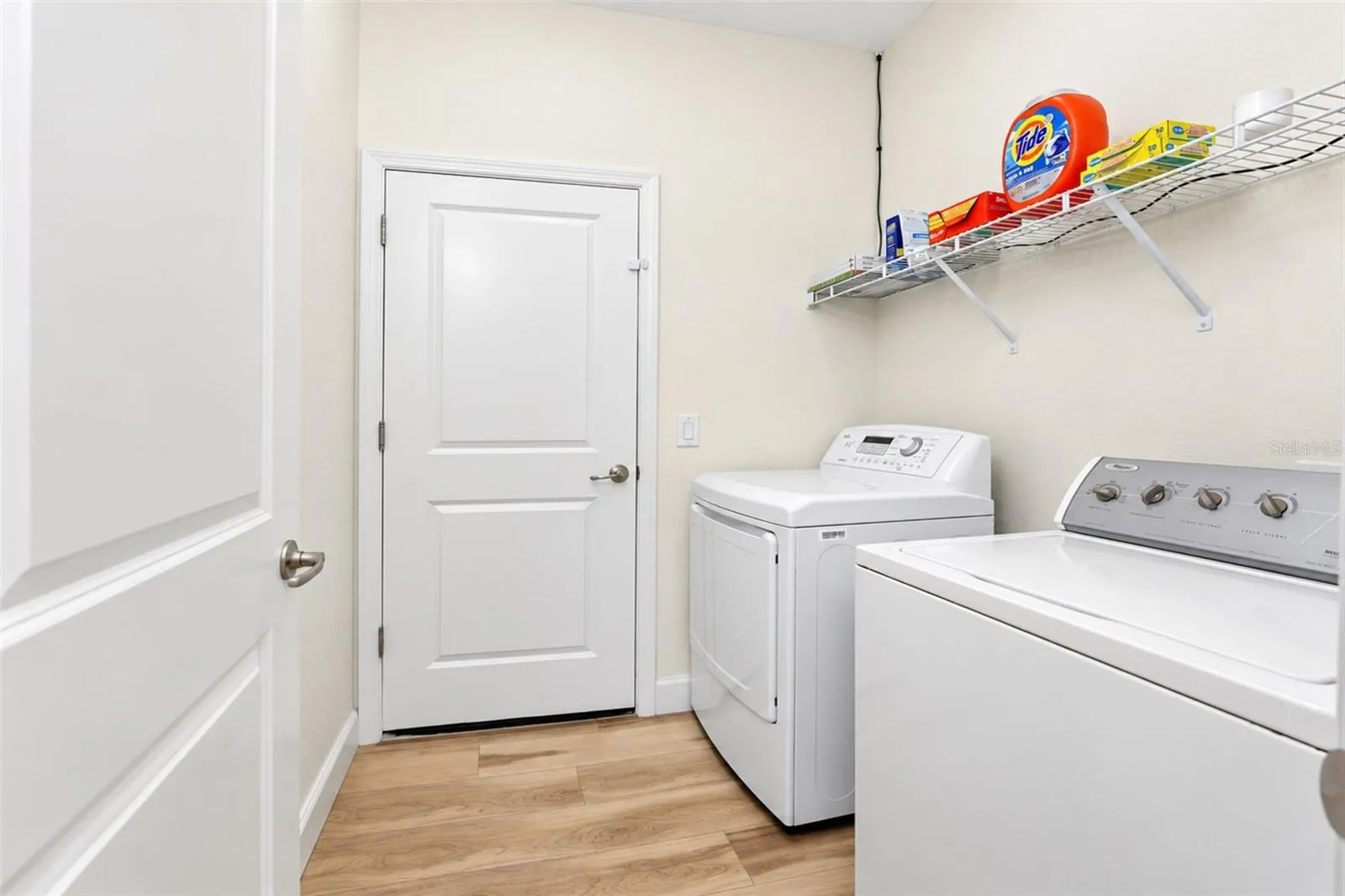 Washer/Dryer room with access to 2-car garage