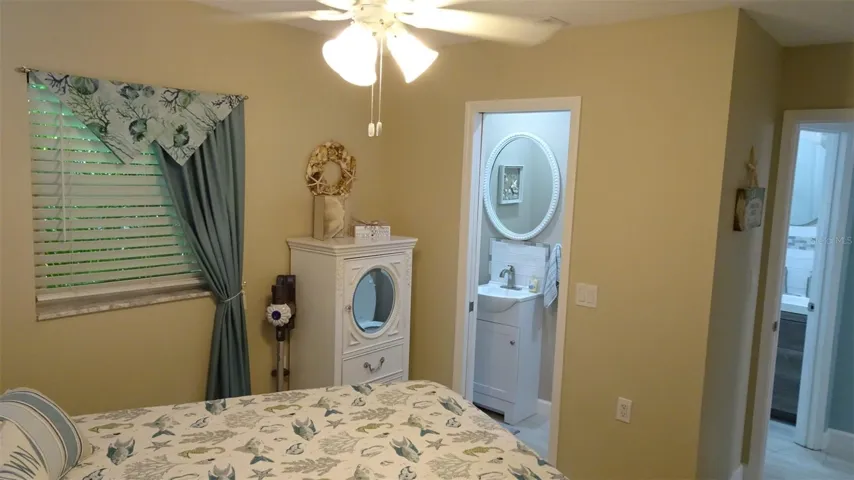 Seller's furnished rear bedroom ensuite.