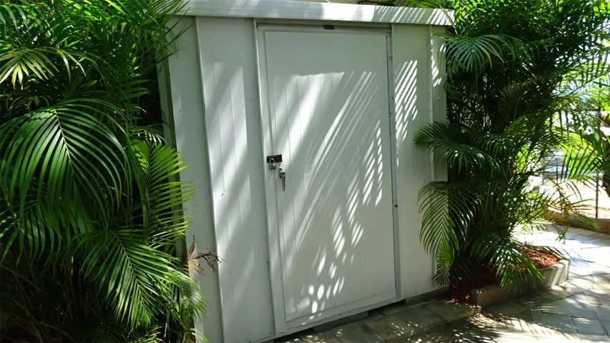 Metal shed included
