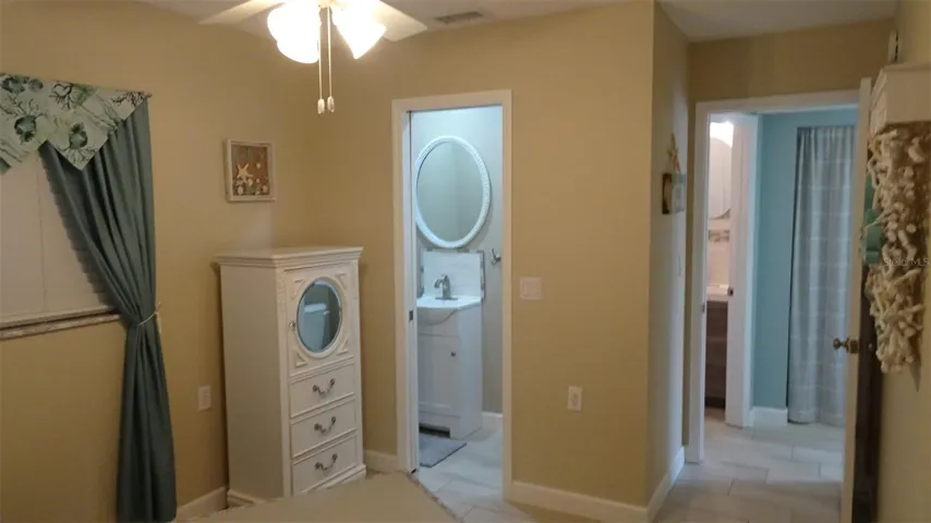 Rear bedroom ensuite with half bath.