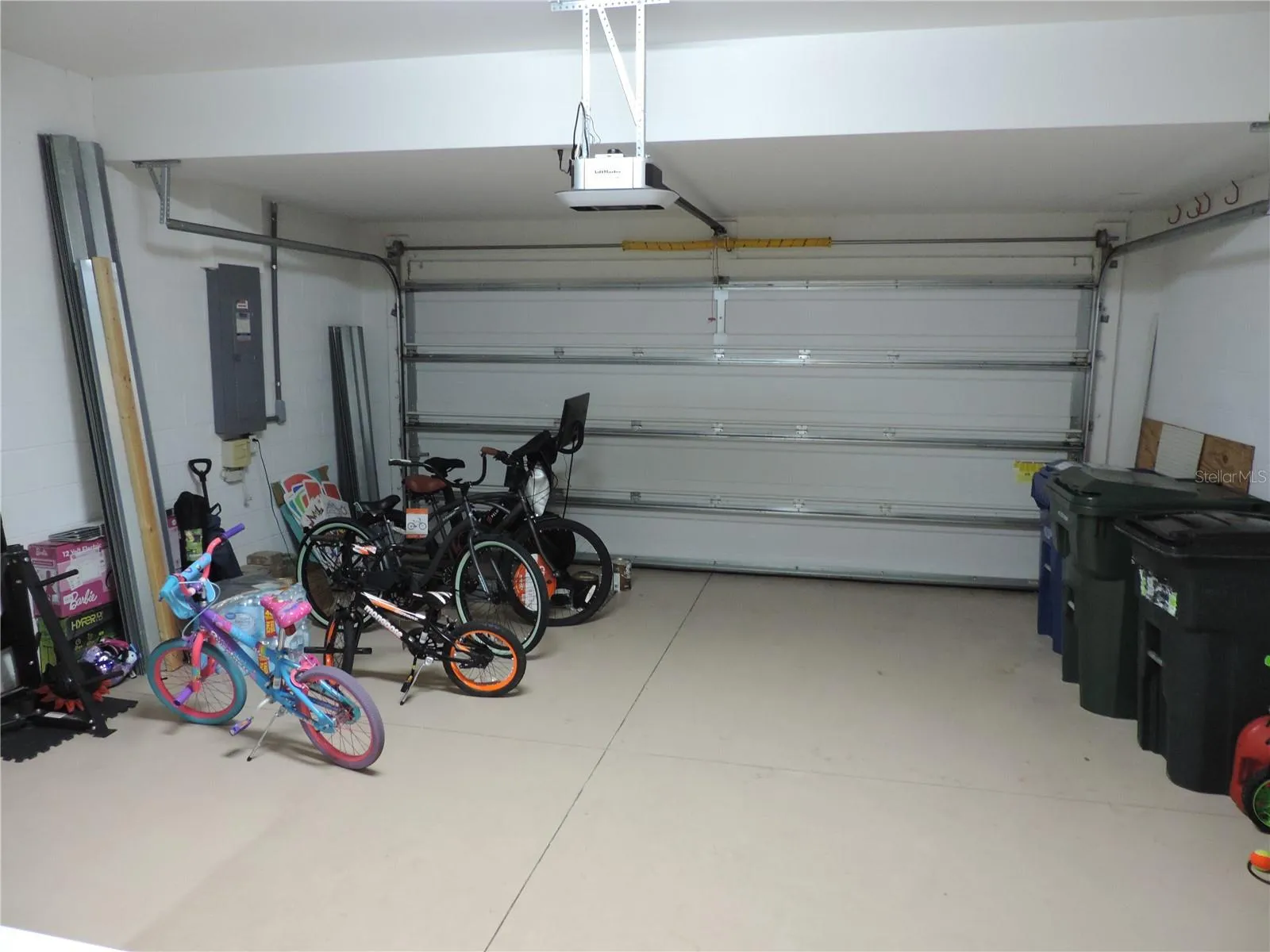 2 car garage with hurricane shutters and impact resistant garage door