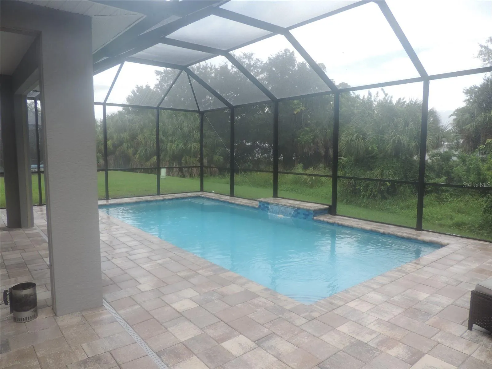 Huge pool with screen enclosure